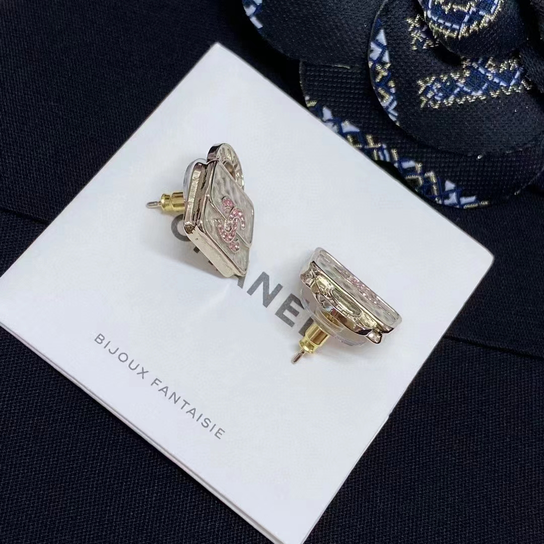 Buy replica Chanel Pink Double C Lock Earrings and replica jewelry from PICKS Jewelry