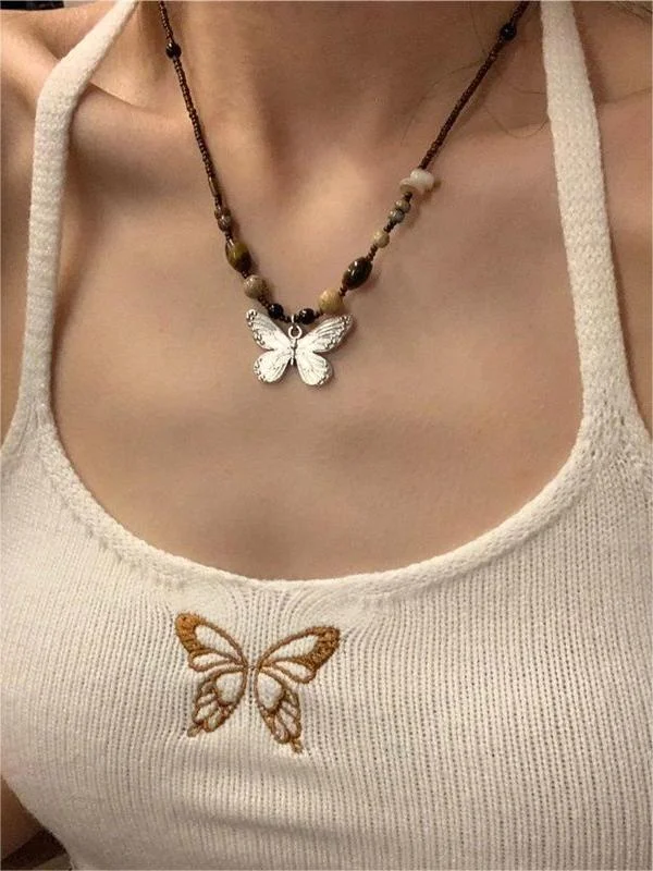 Brownm butterfly necklace with pearl stones
