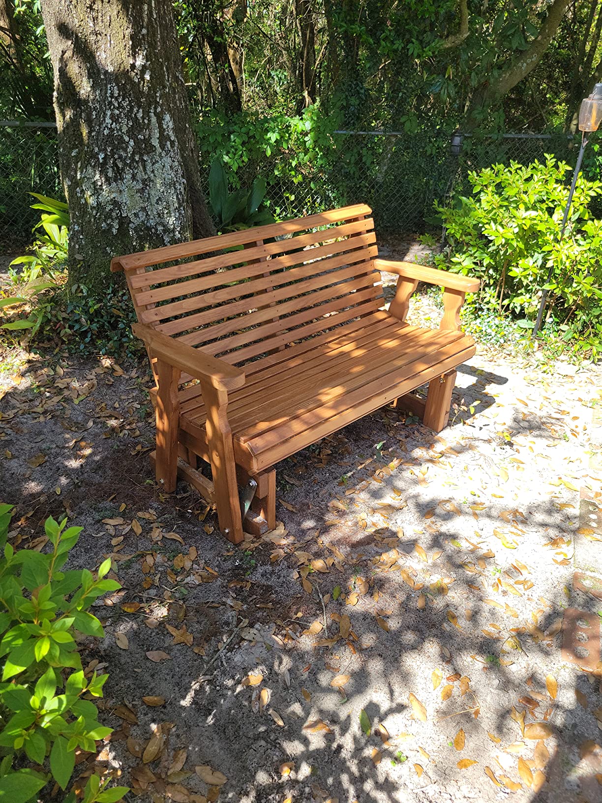 Why Wood Outdoor Gliders Are the Secret Ingredient to a Relaxing Backyard