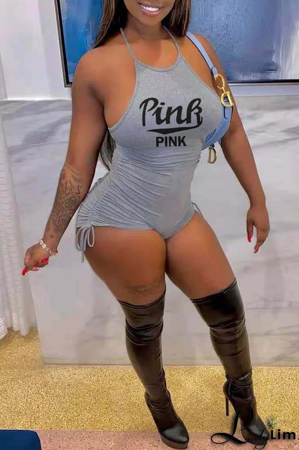 Sky Blue Fashion Casual Letter Print Backless Halter Skinny Romper