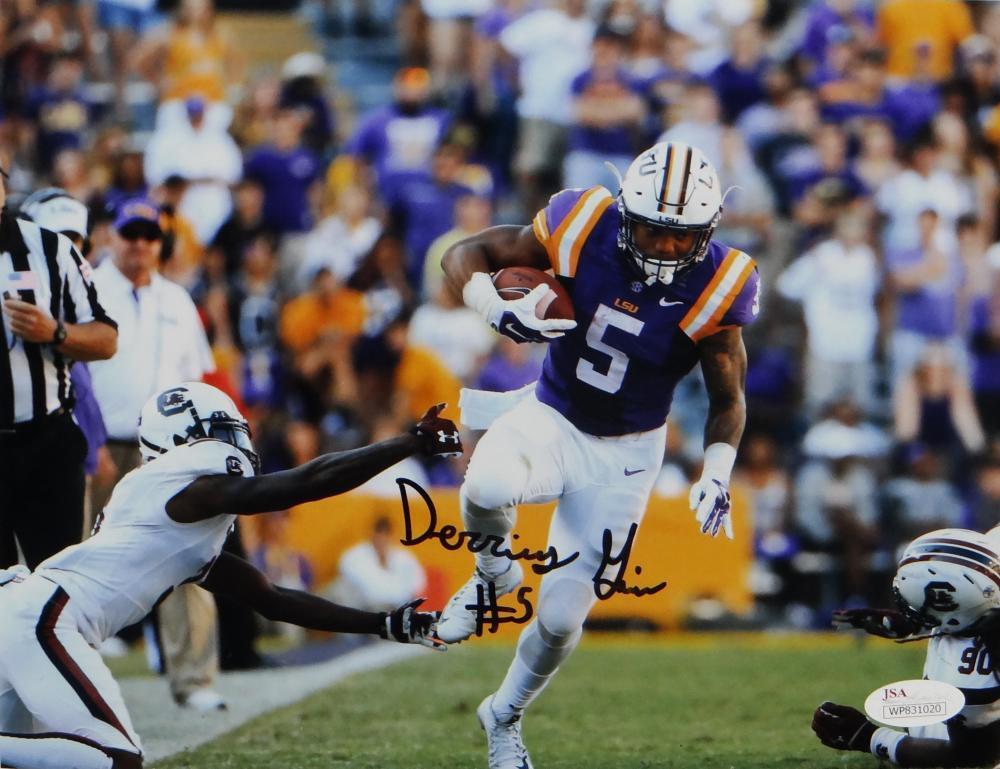 Derrius Guice Autographed LSU 8x10 Avoiding Tackle Photo Poster painting - JSA W Auth *Black