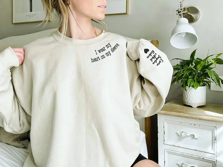 I Wear My Heart On My Sleeve Sweatshirt with Kids Names on Sleeve, Custom Embroidery Neckline Sweatshirt, New Mom Gift