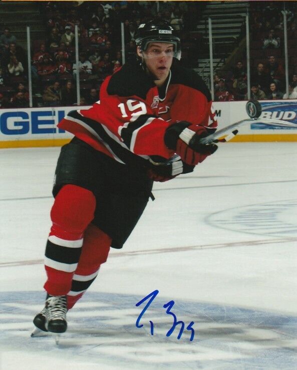 TRAVIS ZAJAC SIGNED NEW JERSEY DEVILS 8x10 Photo Poster painting #4 Autograph