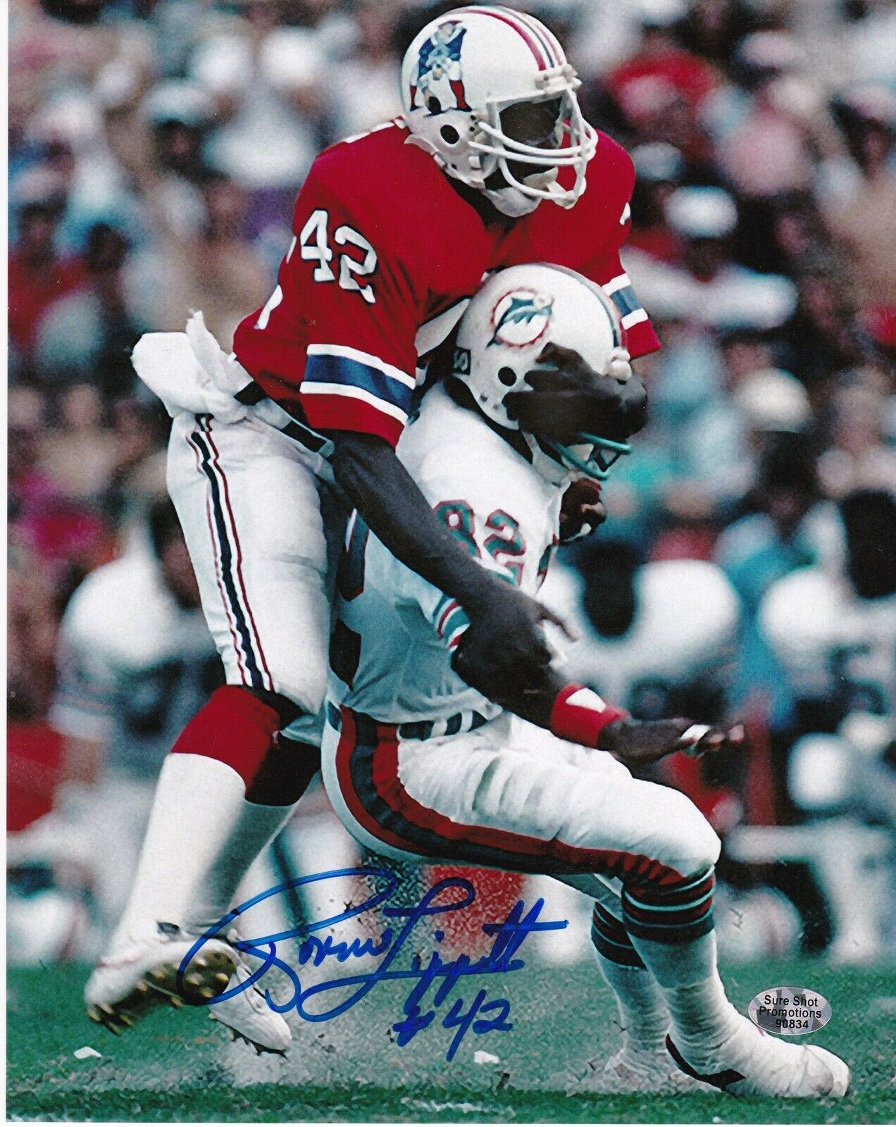 RONNIE LIPPETT NEW ENGLAND PATRIOTS ACTION SIGNED 8x10