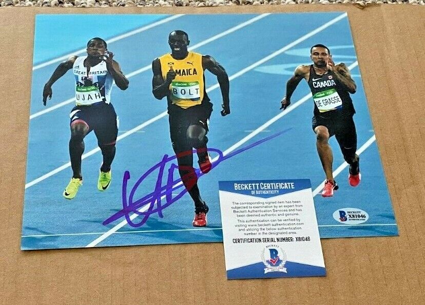 USAIN BOLT SIGNED OLYMPICS 8X10 Photo Poster painting BECKETT CERTIFIED #5