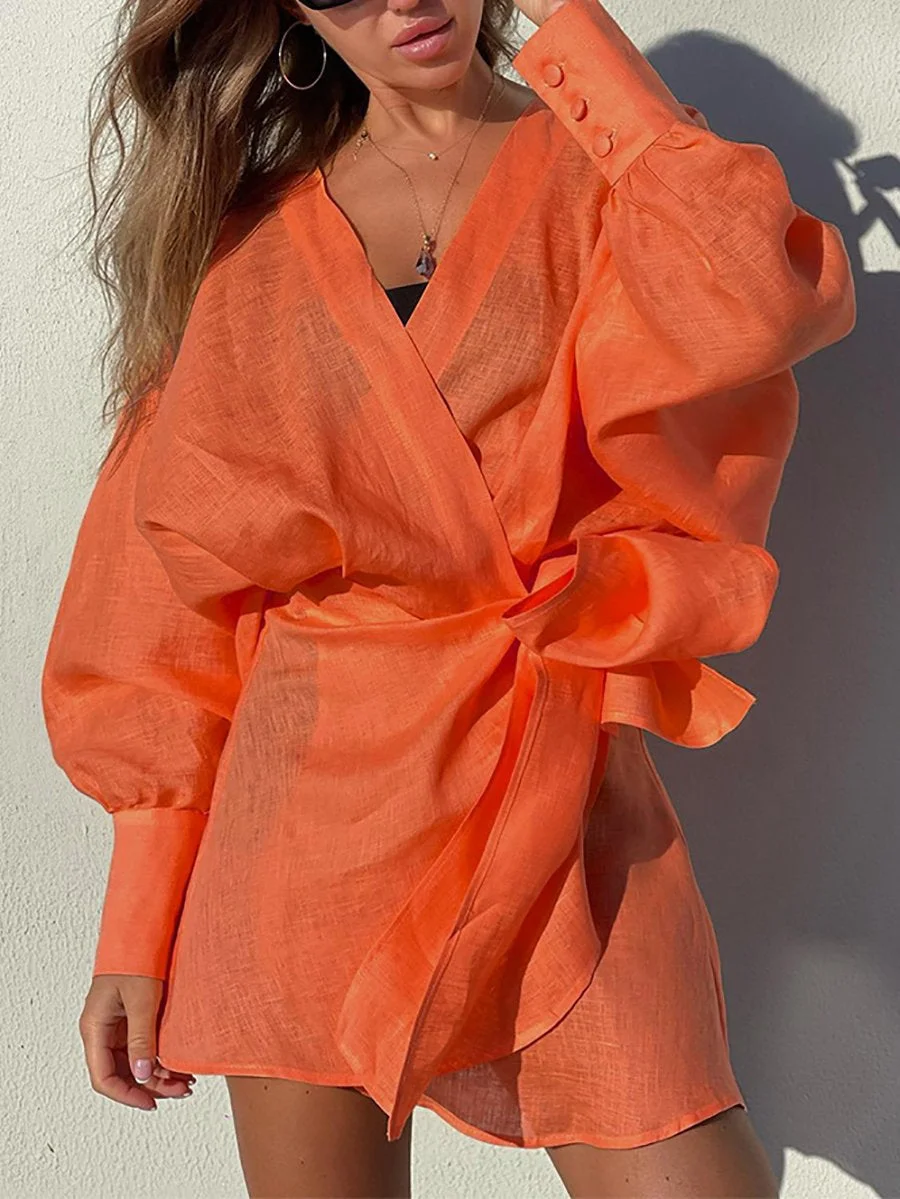 Irregular mini dress with long sleeves