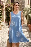 Front view of elegant blue dandelion print dress with wooden buttons for mature women