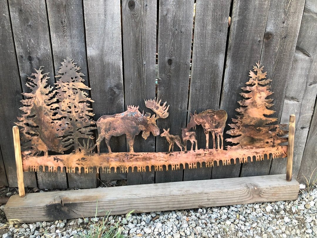Moose in trees crosscut saw metal wall art