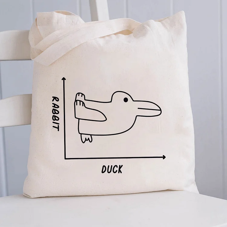 Pupiloves  Rabbit and duck can't tell the difference between Tote Bag