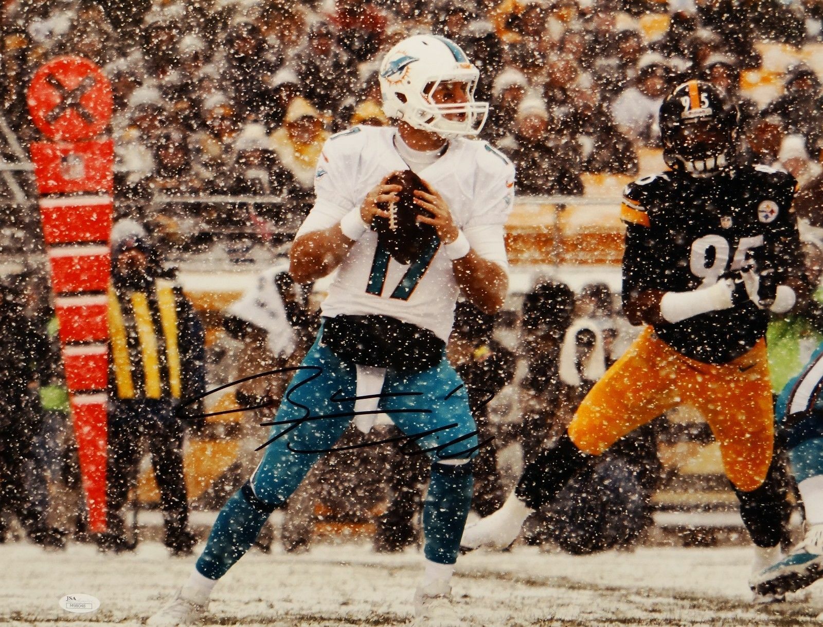 Ryan Tannehill Autographed 16x20 Miami Dolphins Running In Snow Photo Poster painting- JSA Auth