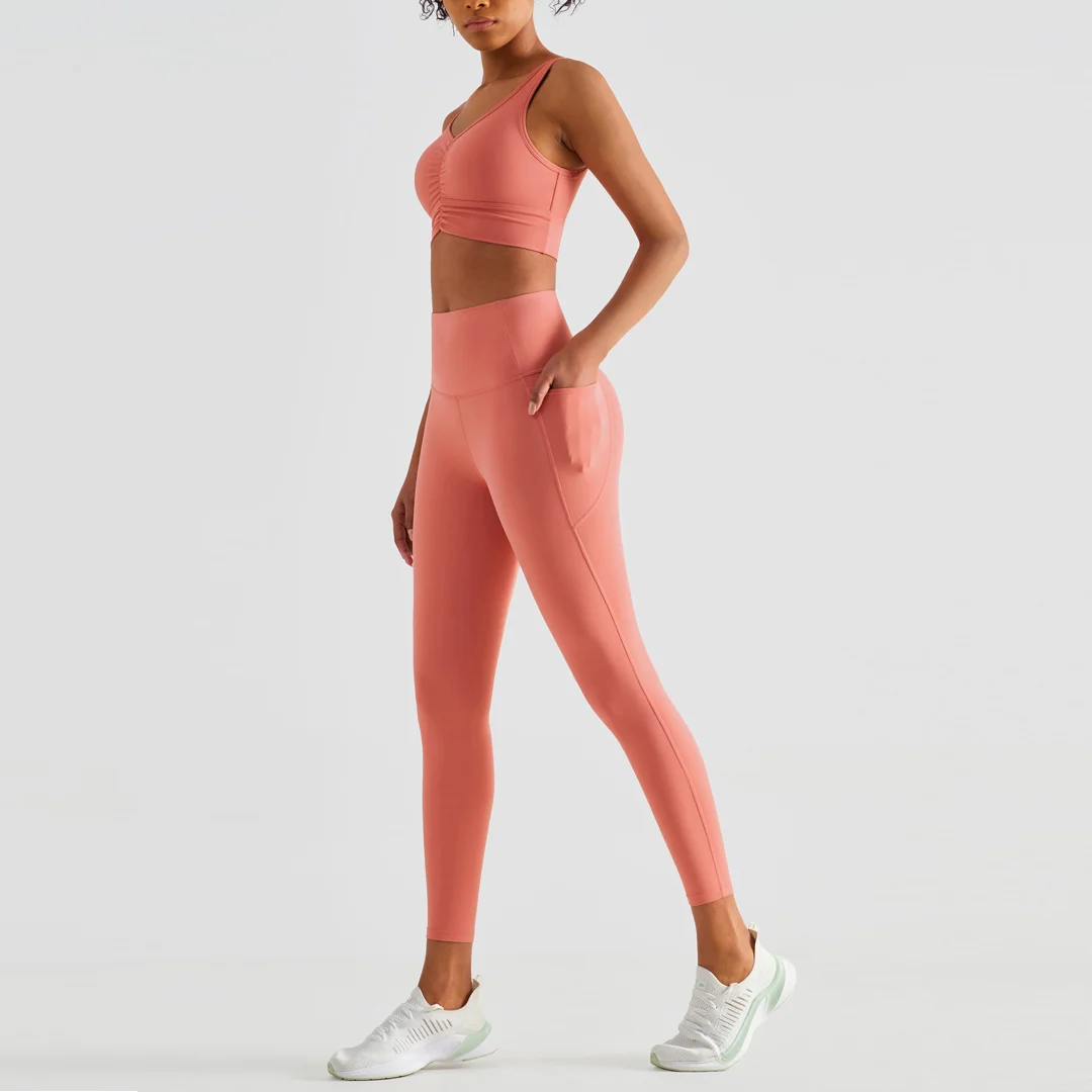 Pleated push-up sport bra + pocket high-waisted legging 2-piece set