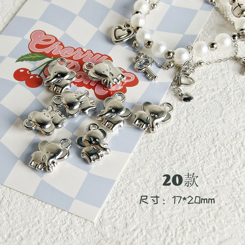 10 PCS/Package 7 * 12mm Arylic Cross Cherry Bow Knot Polished Pendant Jewelry Accessories