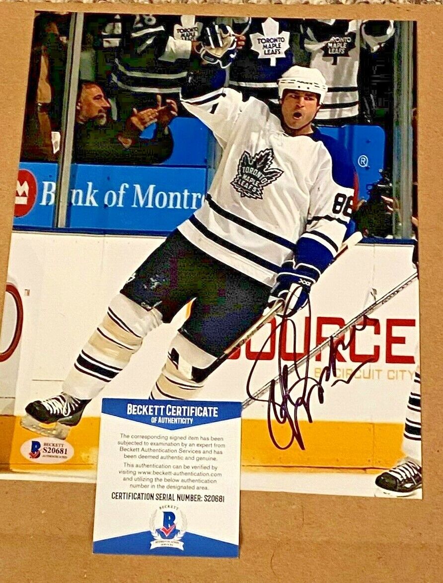 ERIC LINDROS SIGNED 8X10 TORONTO MAPLE LEAFS Photo Poster painting BECKETT CERTIFIED