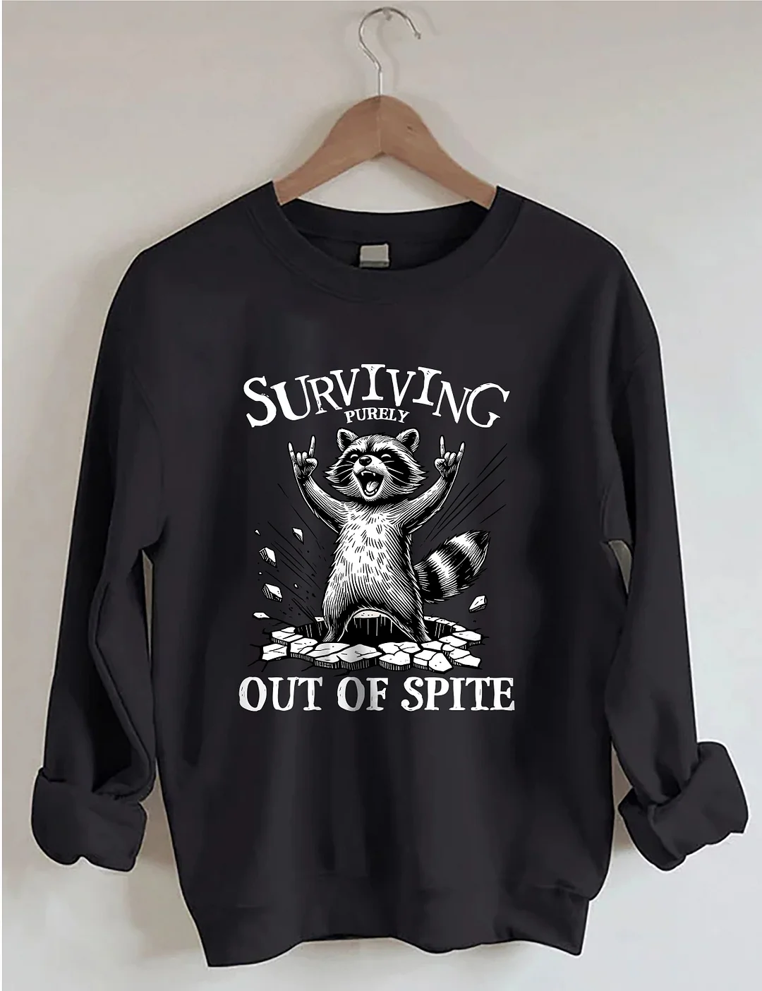 Surviving Purely Out Of Spite Raccoon Sweatshirt