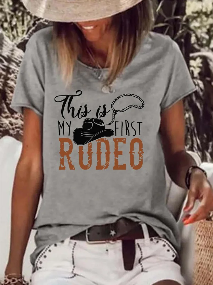 This is my first rudeo village life Raw Hem Tee