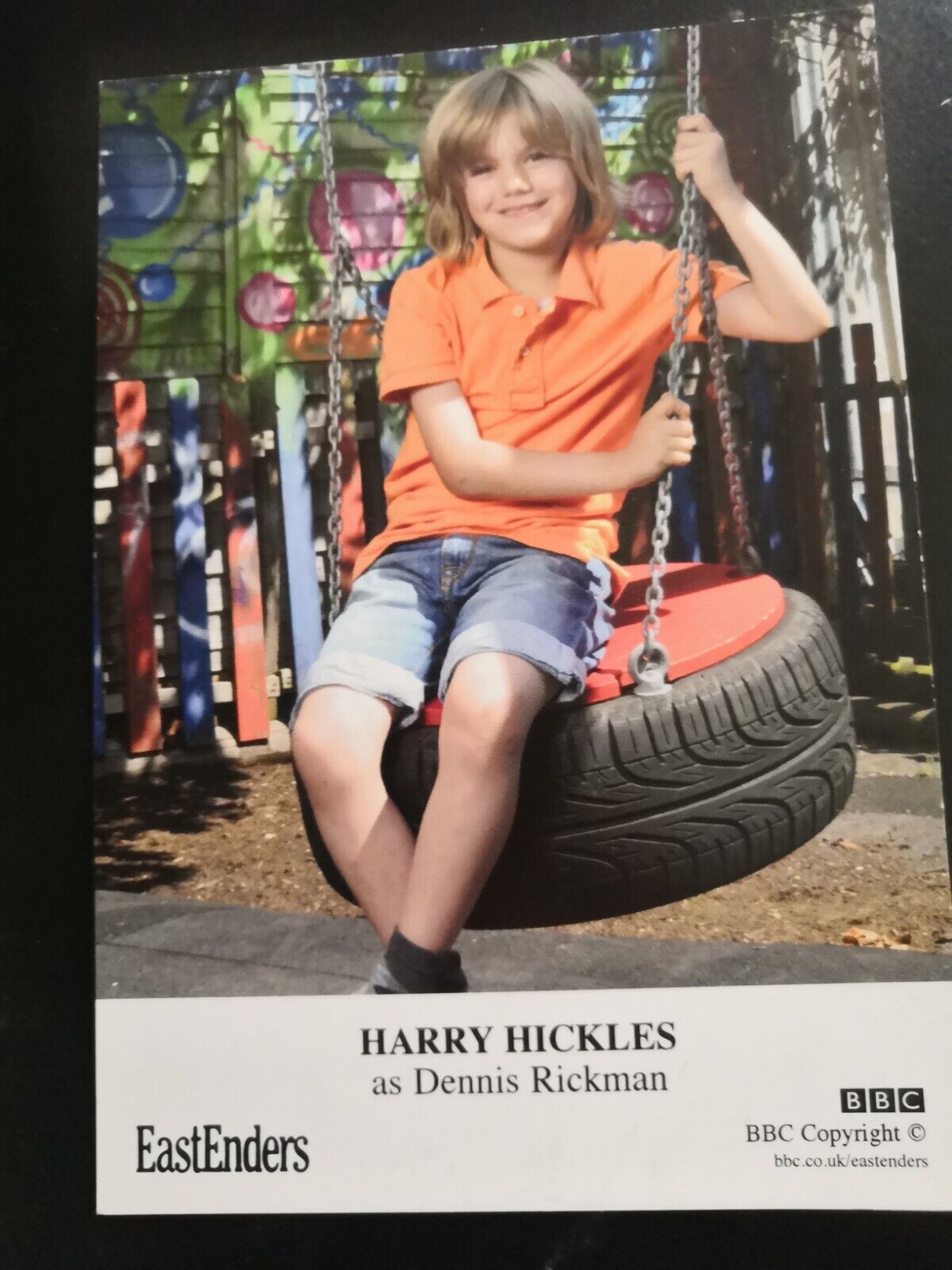 EASTENDERS UNSIGNED CAST CARD OF HARRY HICKLES