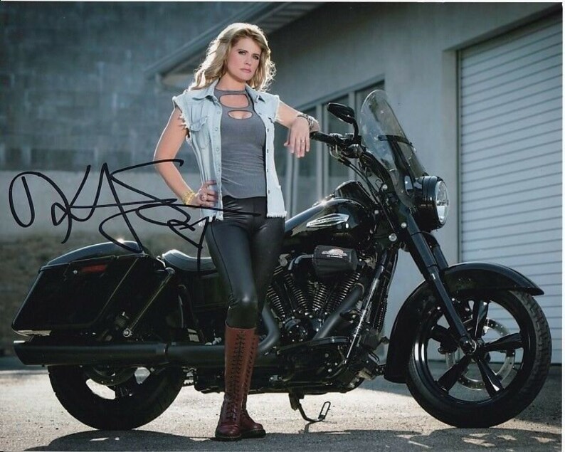 Kristy swanson signed autographed harley davidson motorcycle Photo Poster painting