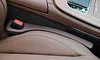 Car fills the gap between the seat and console gap filler in the side seat organizer