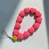 European and American high-grade rose red heart resin mobile phone lanyard ins style yellow smiley face anti-lost bracelet
