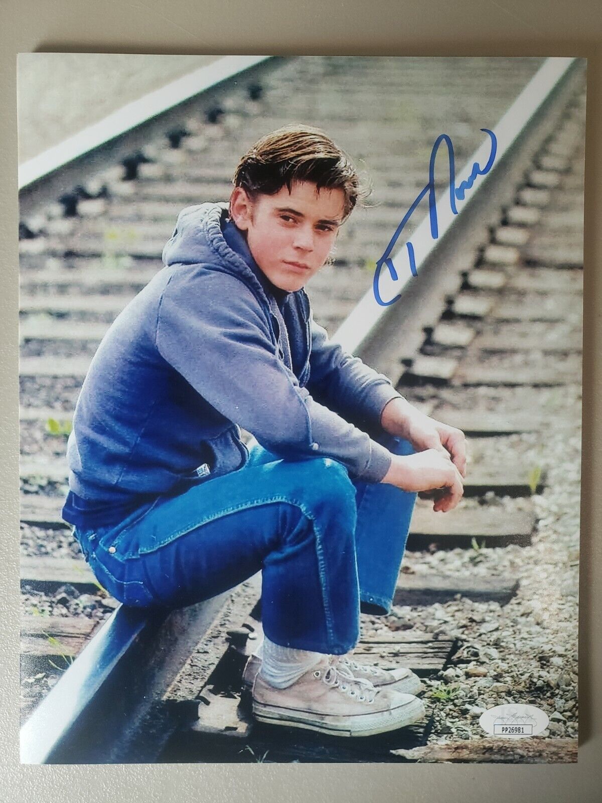 8X10 Autographed by C Thomas Howell in The Outsiders. JSA