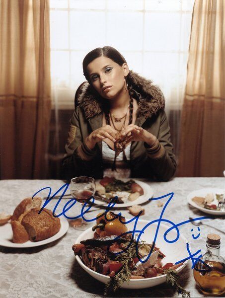 Nelly Furtado genuine autograph 8x10