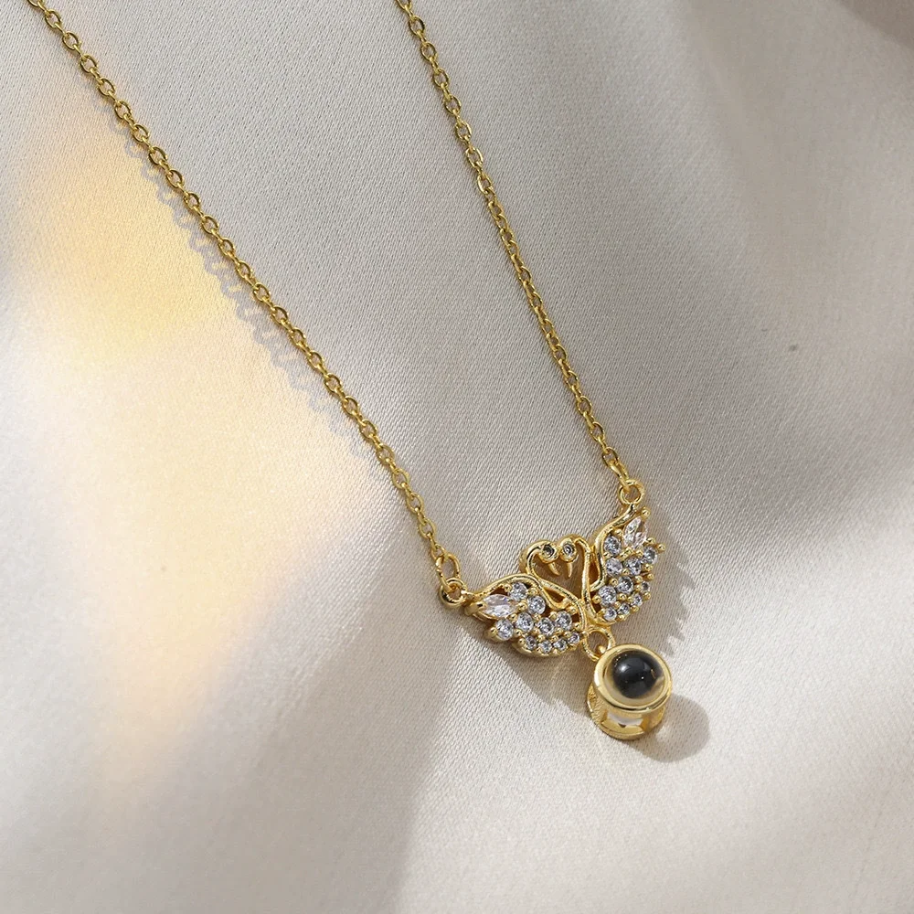 Swan Zirconia Gold-Plated Necklace Projecting “I Love You” in One Hundred Languages