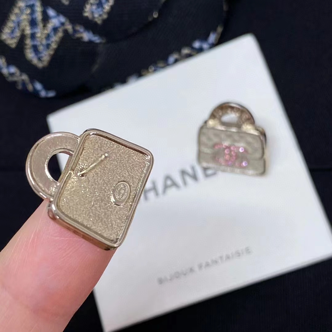 Buy replica Chanel Pink Double C Lock Earrings and replica jewelry from PICKS Jewelry