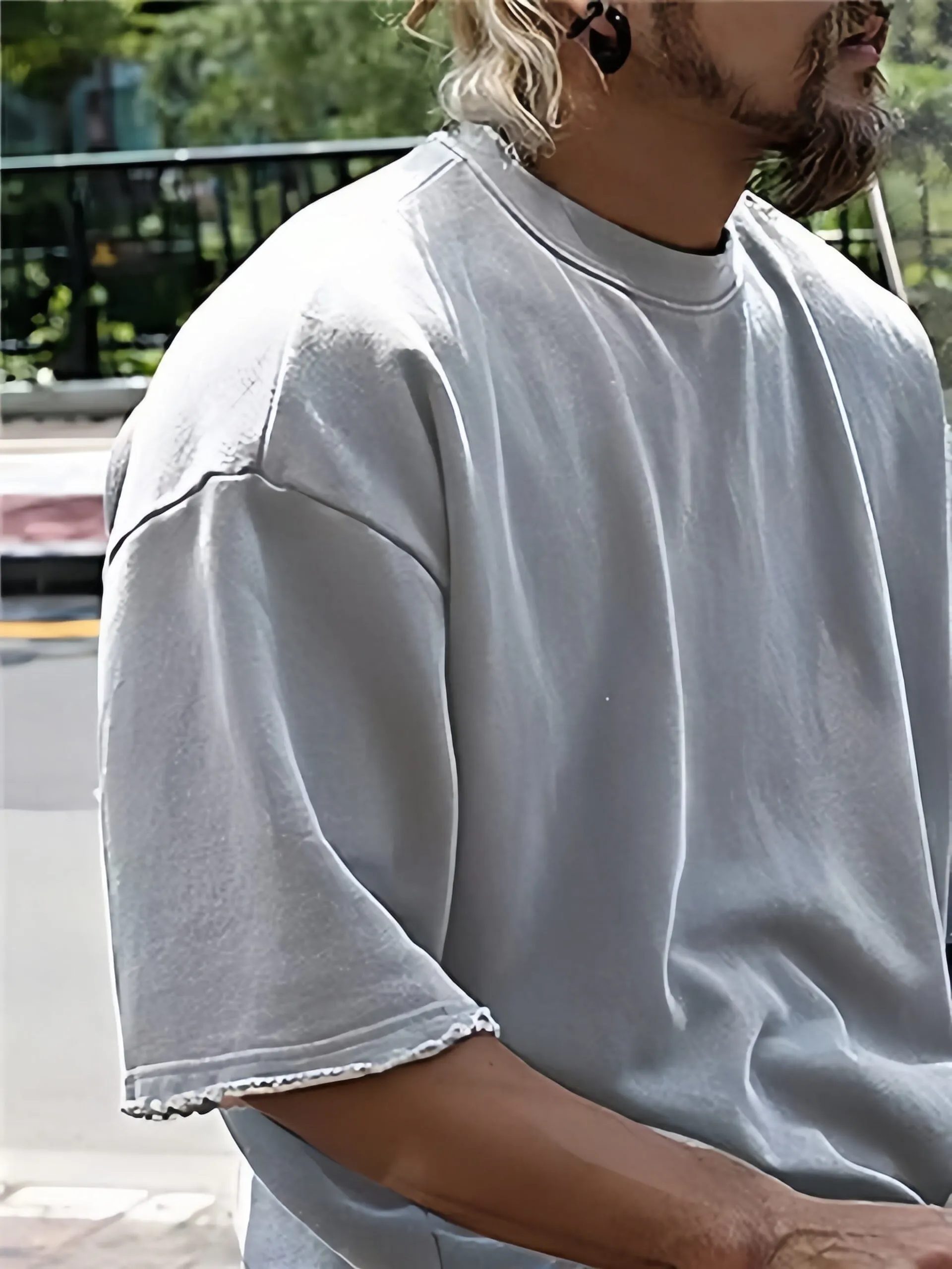 Close view of the relaxed short-sleeve top