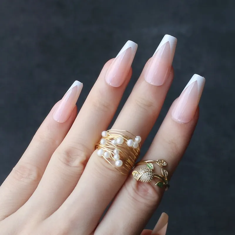 White tipped coffin nails out line UV french tips nude glossy fasle nails sophisticated nude with little bit of tipping edge-Nail Inspo