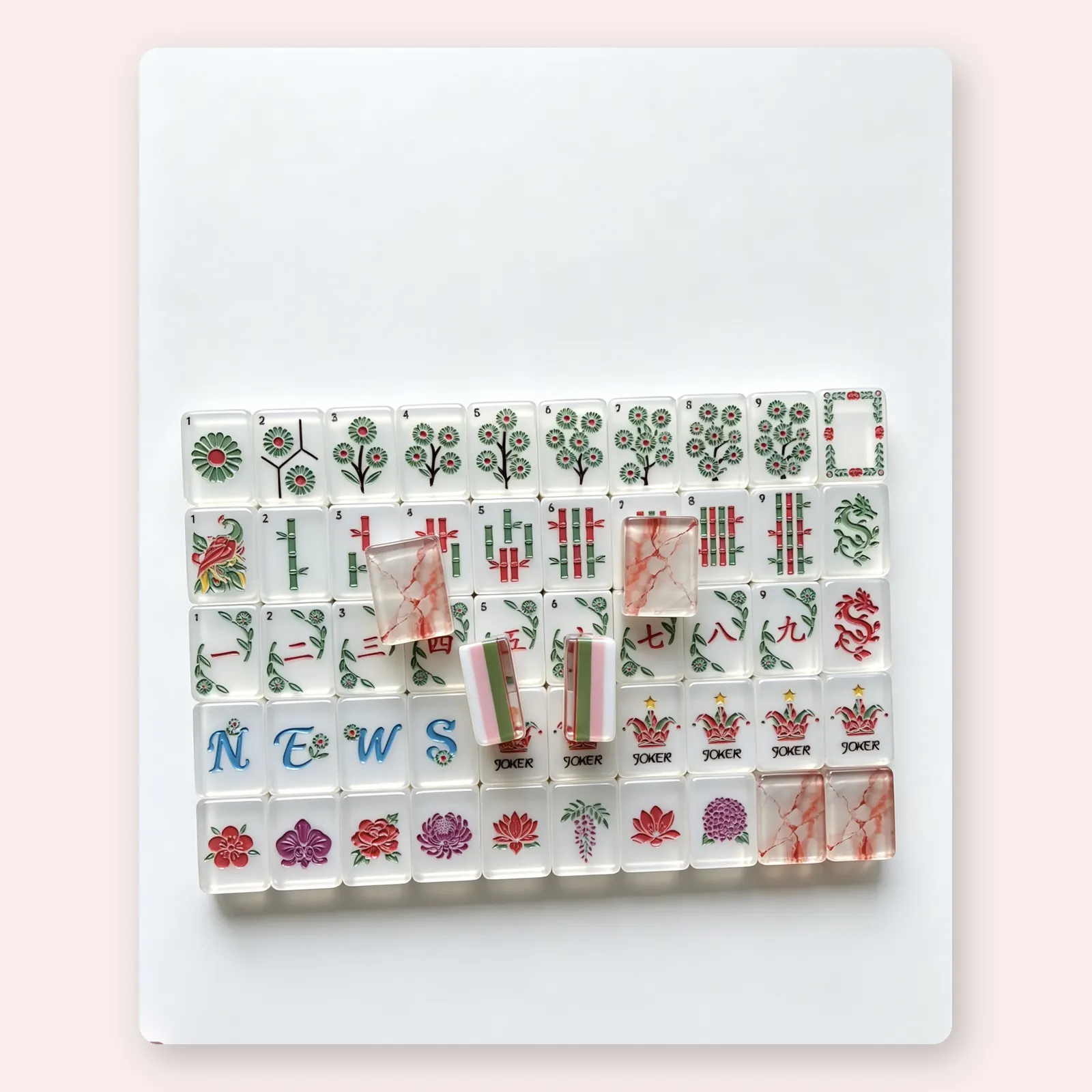 Blush Allure American Mahjong tiles in a styled setting