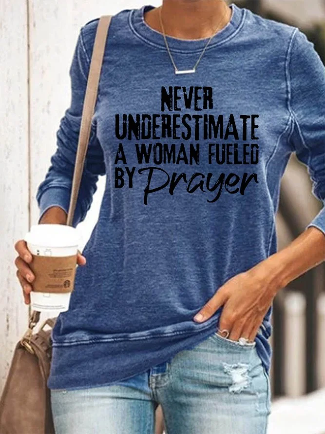 Never Underestimate A Woman Fueled By Prayer Women's sweatshirt