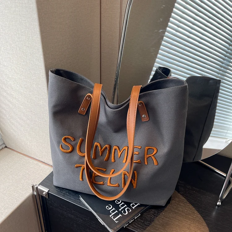 Casualruby © Embroidered letter canvas tote bag 