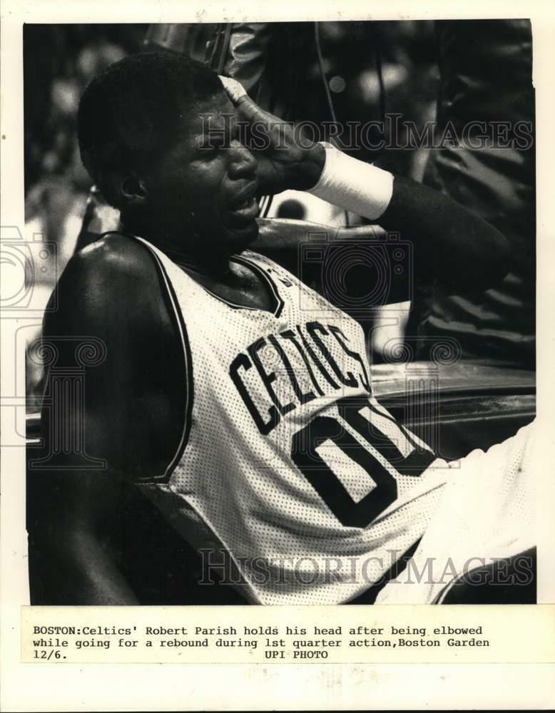 Press Photo Poster painting Boston Celtics' Robert Parish injured head during basketball action