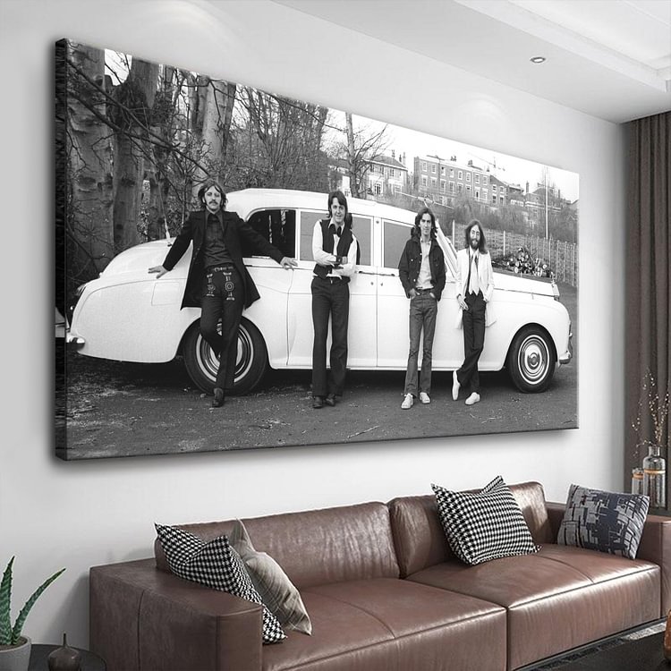 The Beatles in front of John Lennon's Rolls Royce Phantom. 1969 Canvas Art