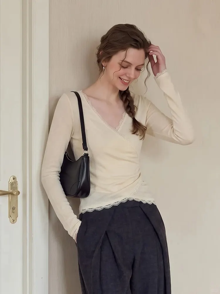 apricot V-neck lace-trimmed long-sleeved top