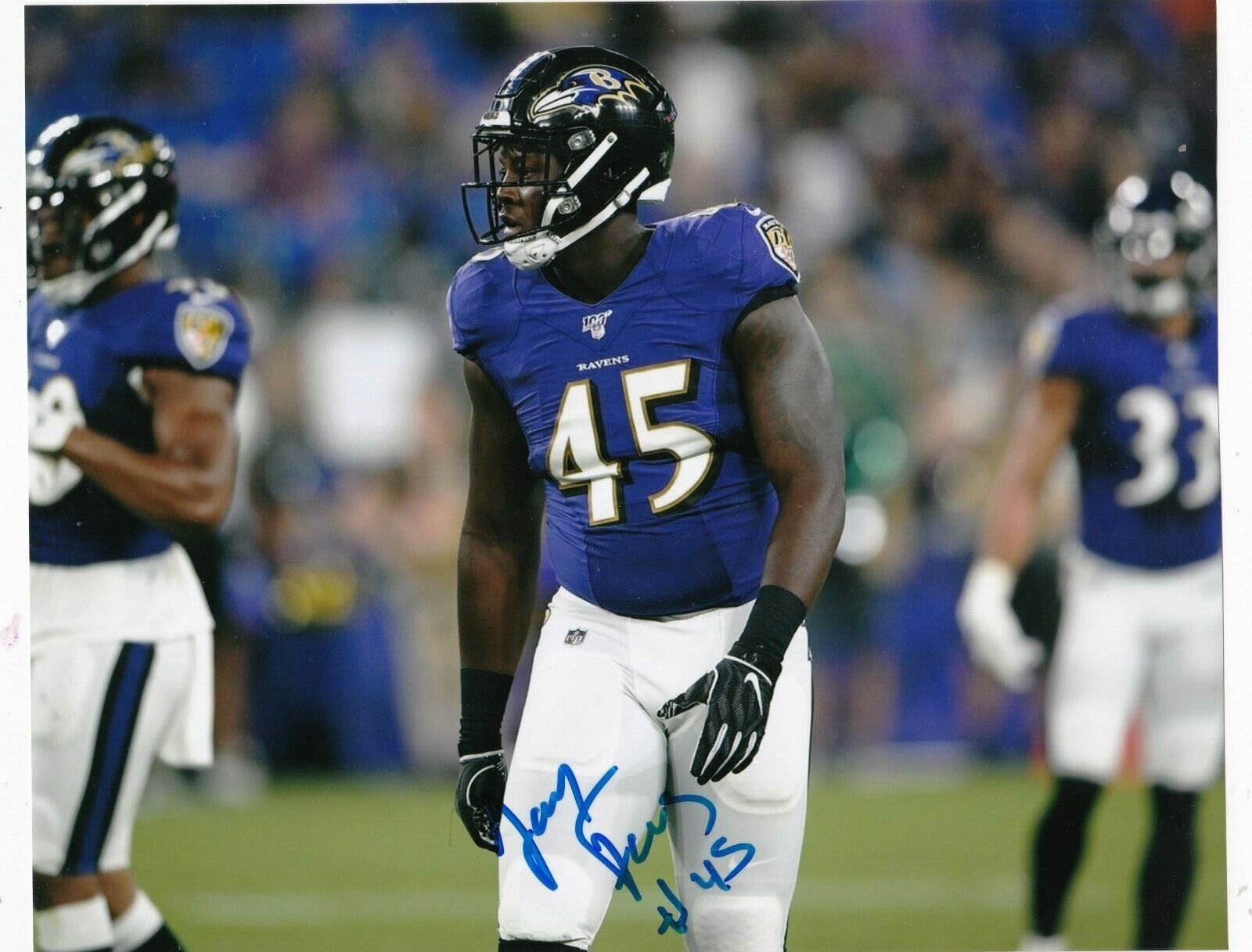 JAYLON FERGUSON BALTIMORE RAVENS ACTION SIGNED 8X10