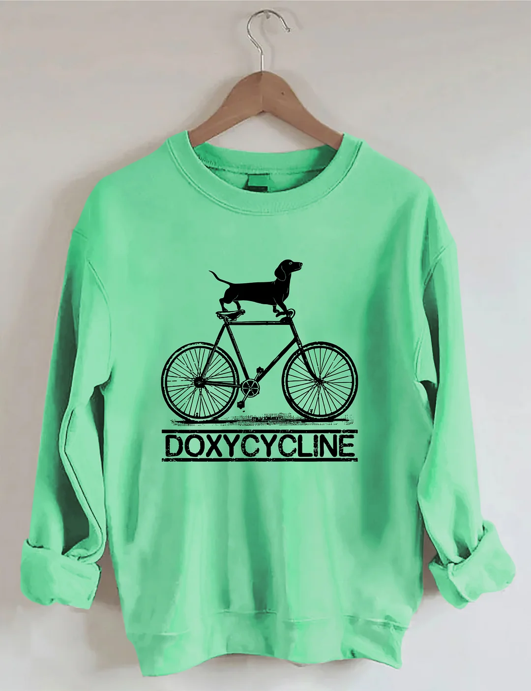 Doxycycline Dachshund On Bicycle Pharmacists Sweatshirt