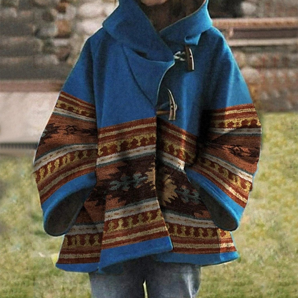 beth's blue poncho on yellowstone