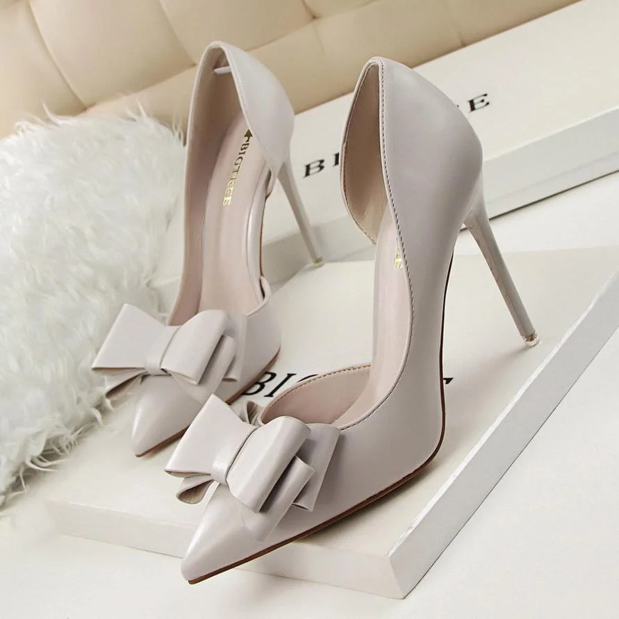 Fashionable bow-knot high-heeled stiletto shoes with shallow mouth and side cutout shoes