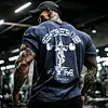 Retro &ldquo;God's Gym Canc&uacute;n Print&rdquo; Washed Gym T-Shirt by Inlyline
