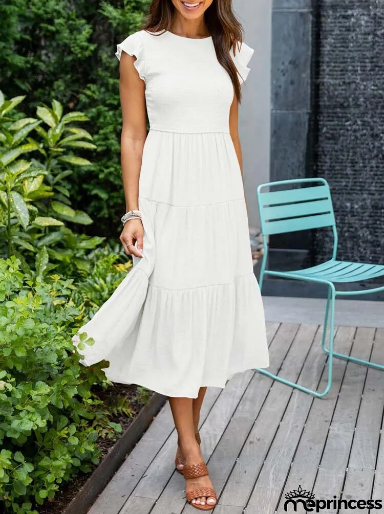 Elegant summer dress: ruffle details, pockets