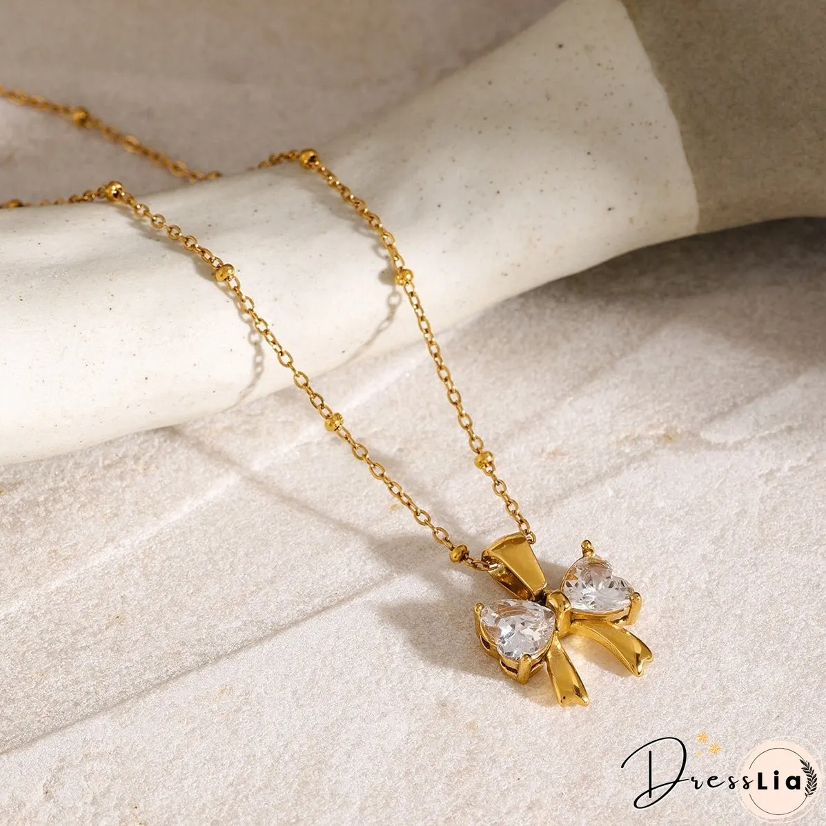 Stainless Steel Inlaid Zircon Bow Necklace