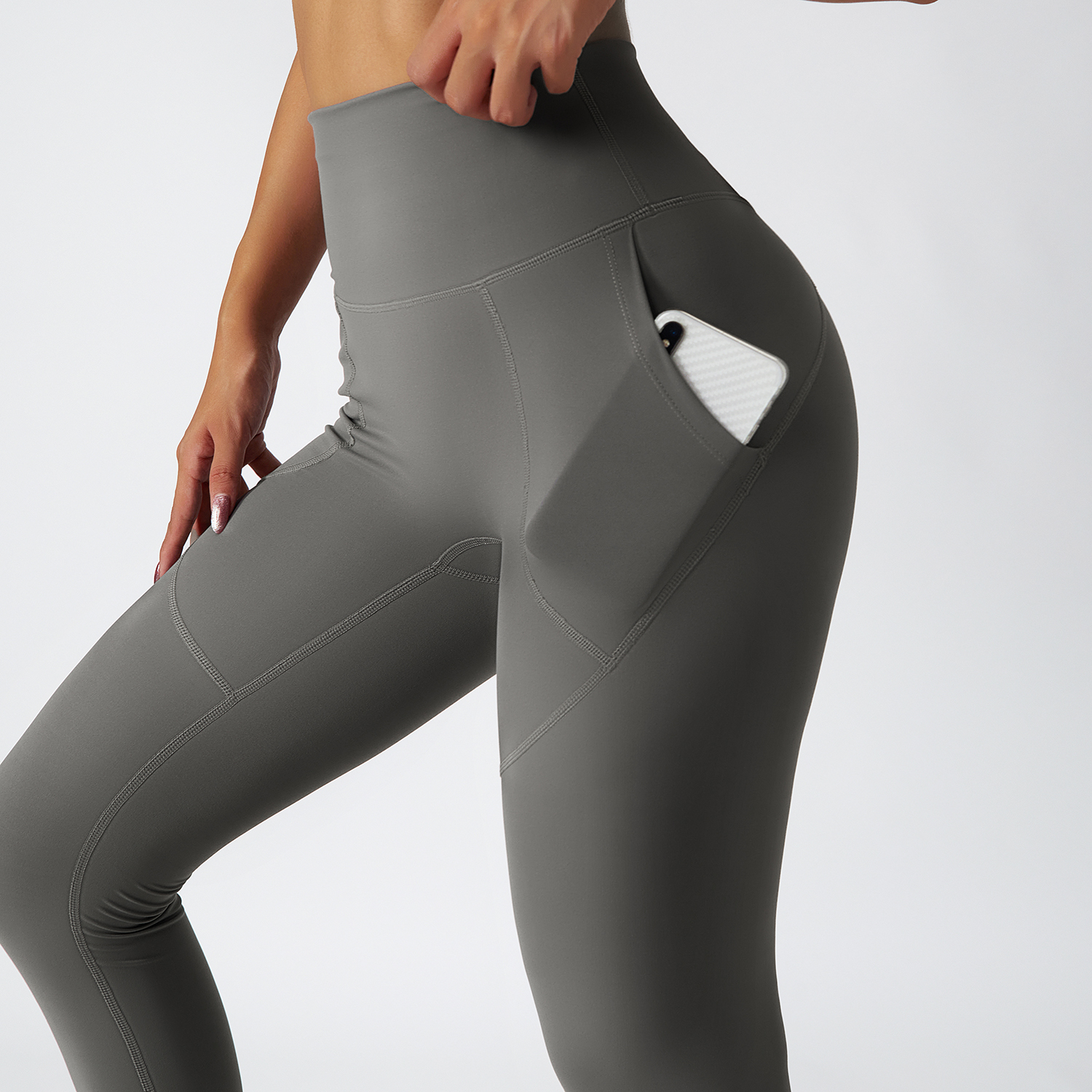 Shop Moonstone Gray renewable fabric sustainable no front seam yoga leggings with side pockets online on Hergymclothing