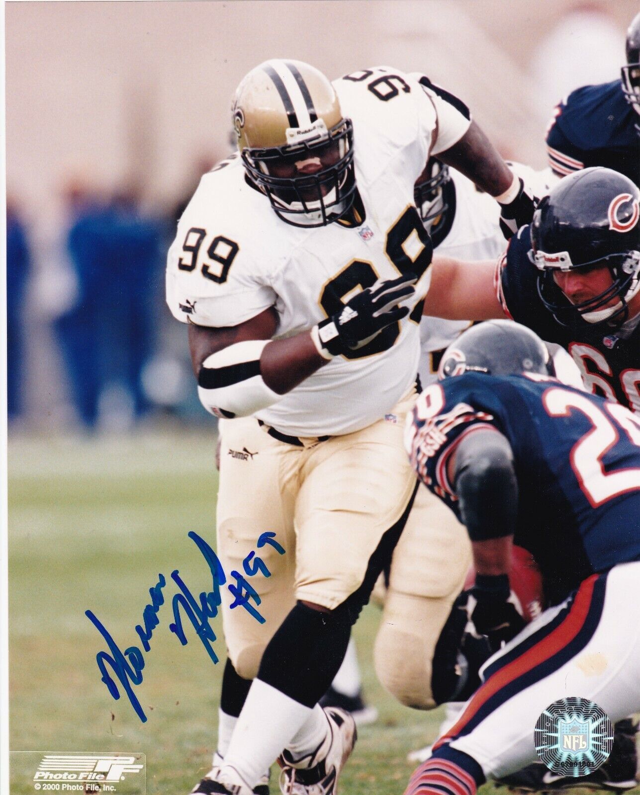 NORMAN HAND NEW ORLEANS SAINTS ACTION SIGNED 8x10