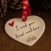 Ornement suspendu en forme de coeur en c&eacute;ramique de No&euml;l