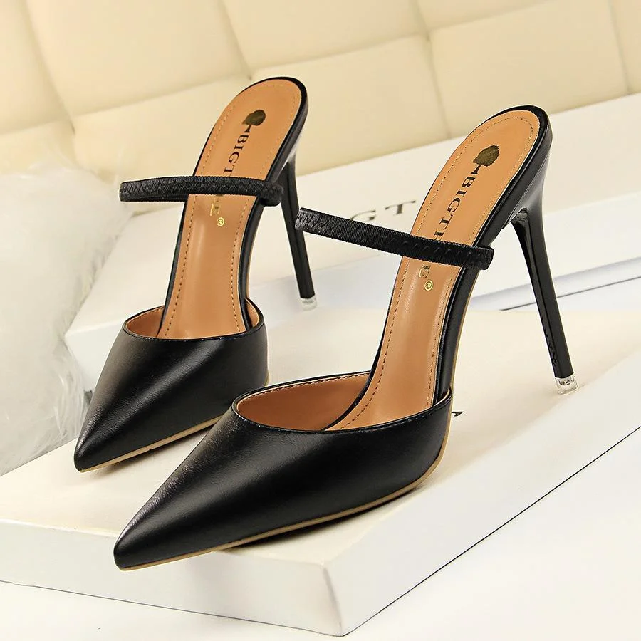 Simple Baotou stiletto with shallow mouth pointed toe hollow word with women's slippers