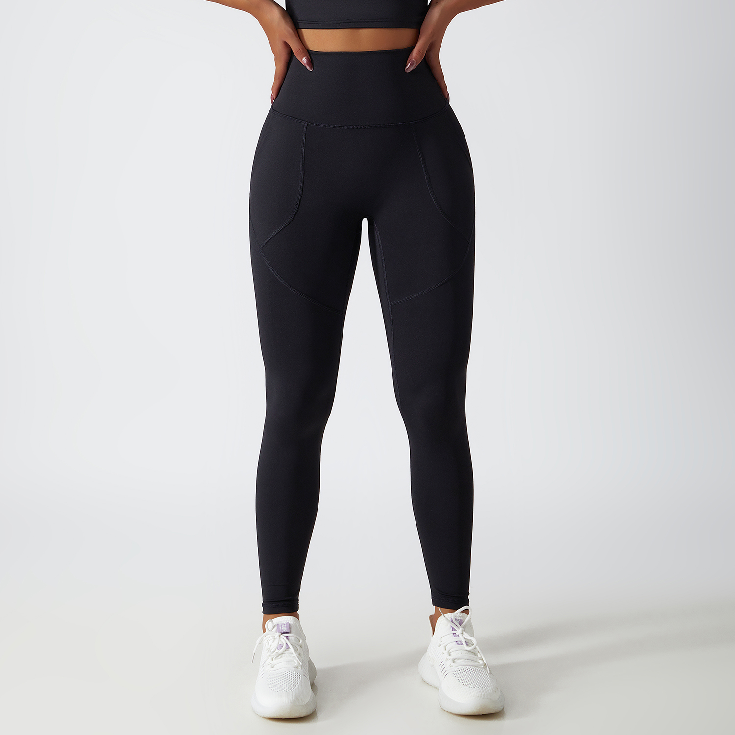 Hergymclothing Black renewable fabric sustainable no front seam yoga leggings with side pockets online shopping