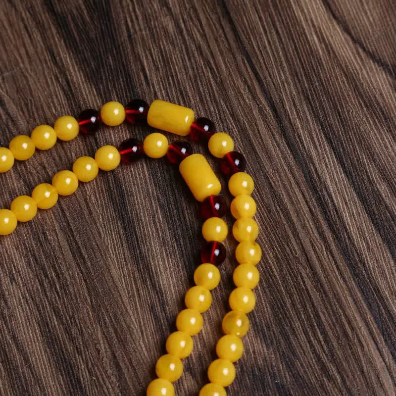 Laughing Buddha Amber Confidence Necklace Pendant