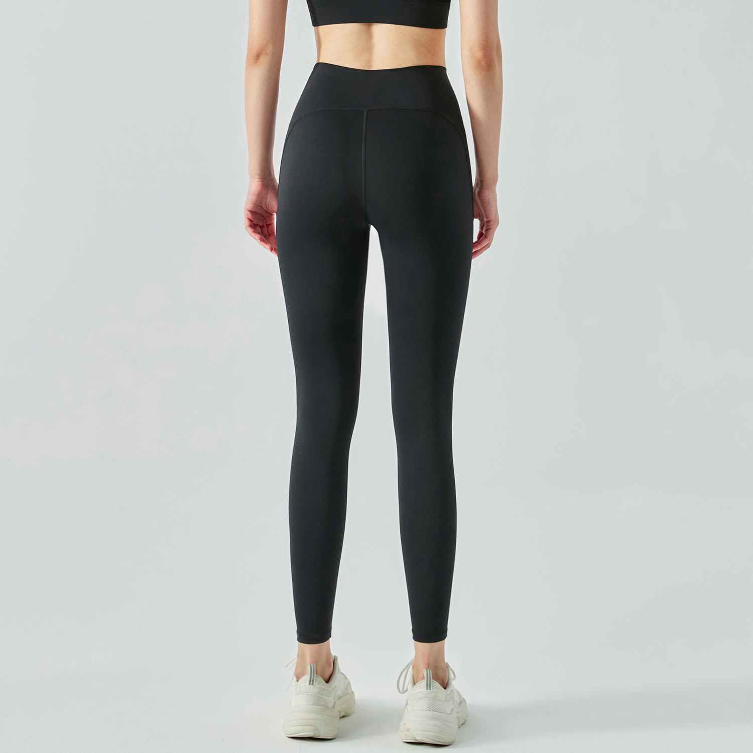 Buy different colors and types of women's high rise traceless naked feeling tummy control slimming waist nylon gym capri leggings on Hergymclothing Black