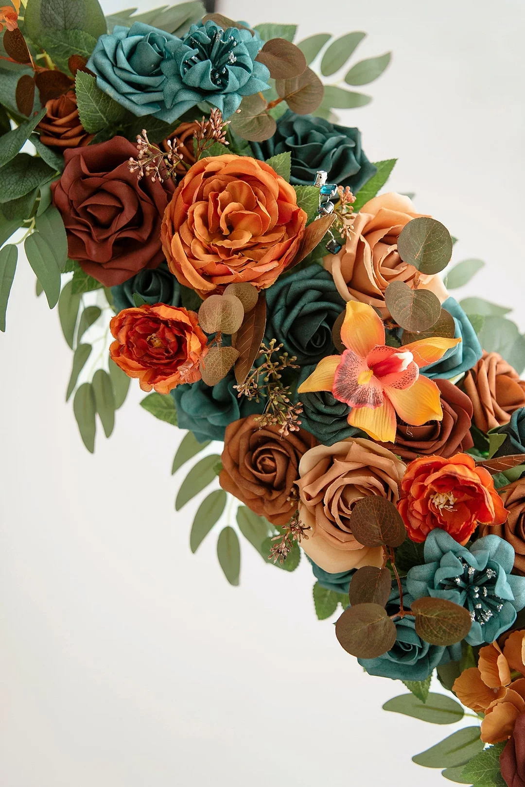 Flower Arrangements for Arch Decor in Dark Teal